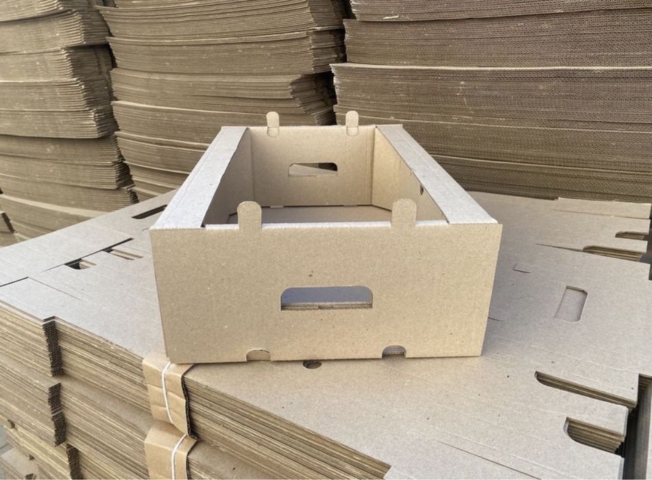 Картонные коробки для фруктов и овощей.