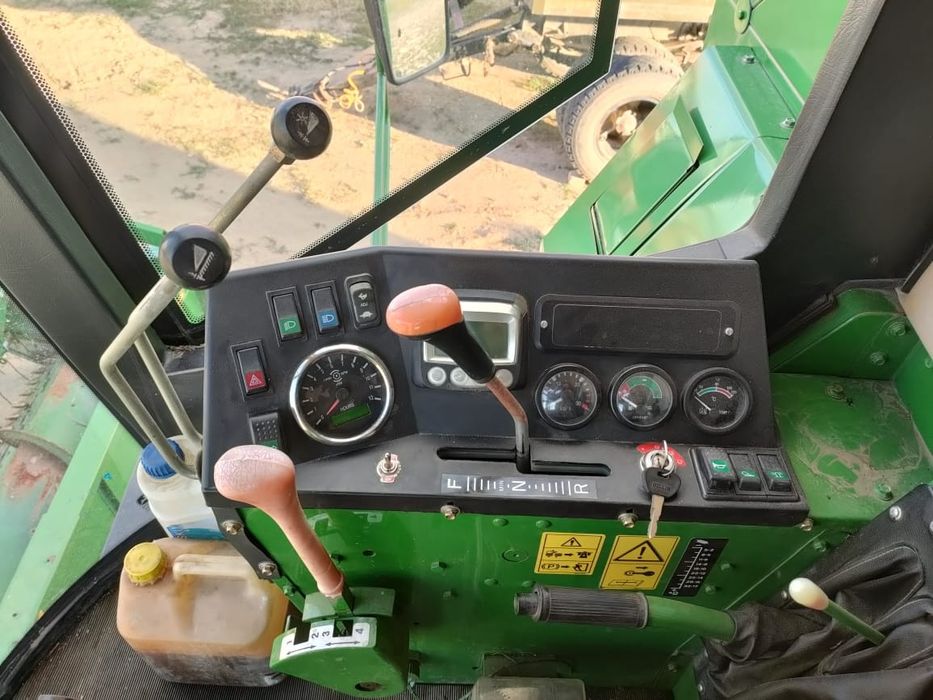 Комбайн John Deere w230