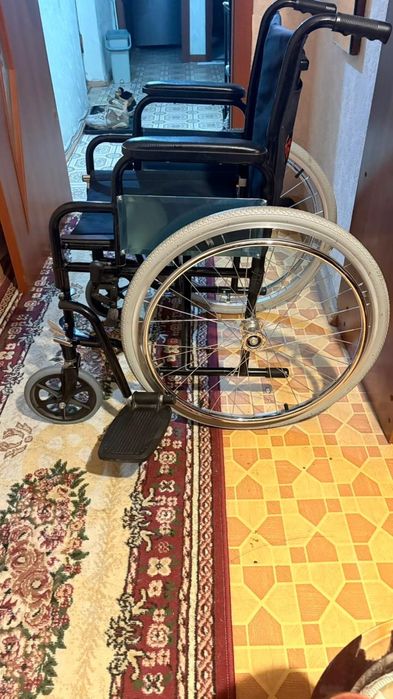 Коляска инвалидная,новая