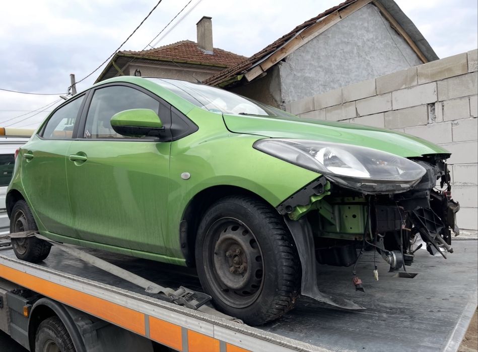Mazda 2/Мазда 2 на части