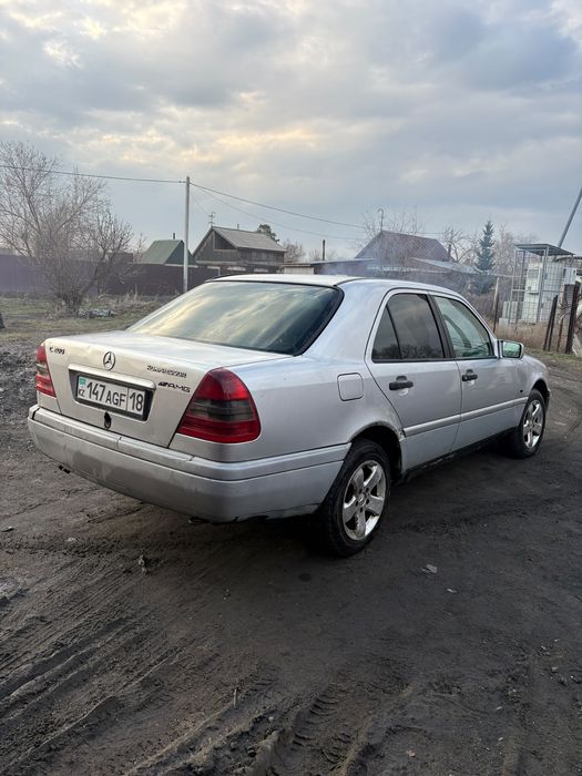 Мерседес C200 w202