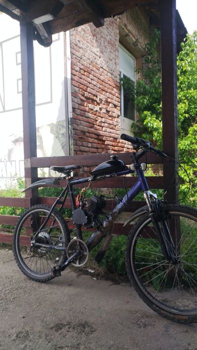 Vând Bicicleta cu motor 100cc perfect funcționala
