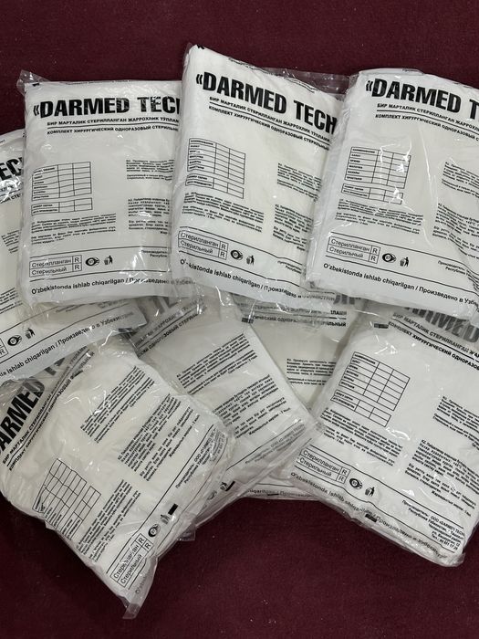 Одноразовый зашитный комбинезон