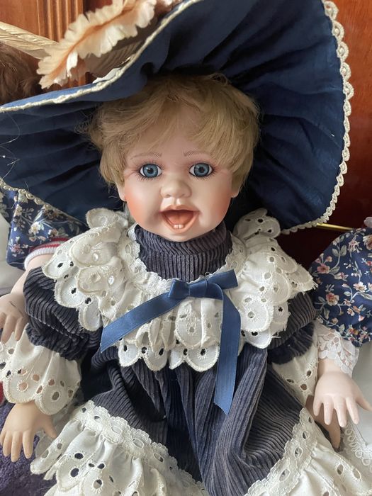 Papusi portelan siperbe pe colectionari