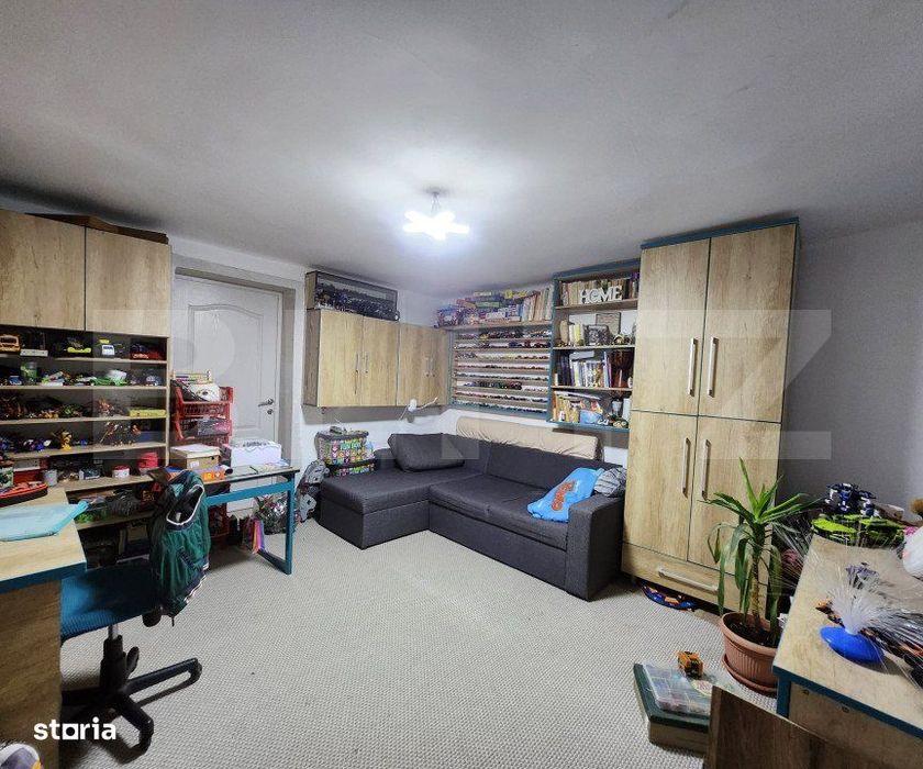 Casa cu 3 camere, 2 bucatarii, Teren de 1000 mp, zona Unirii