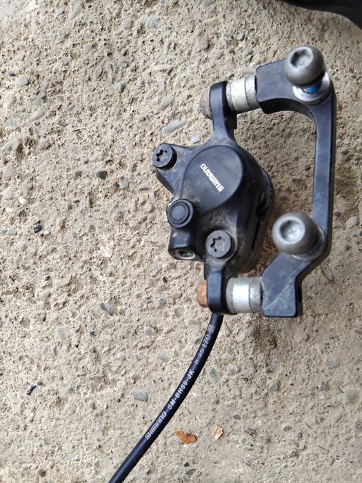 Vând set complet de frâne hidraulice Shimano (față + spate), utilizat.