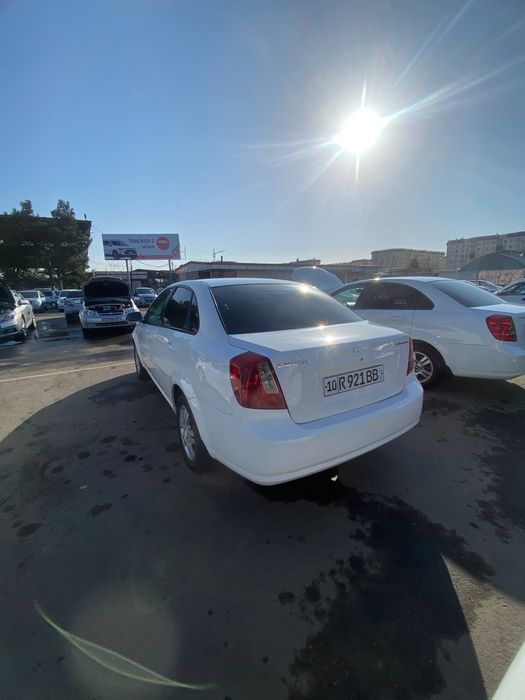 Ласетти 2013.   1.6 матор  пробег 174000 вариантам  бор!!!