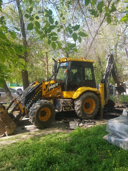 Продам экскаватор-погрузчик