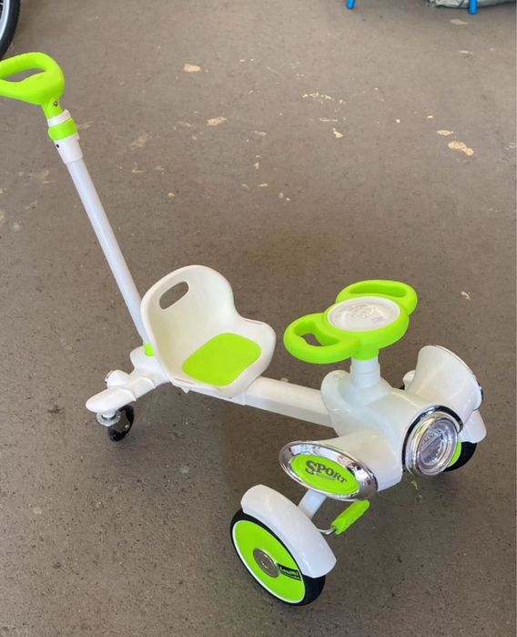 Толокар с педалями и ручкой