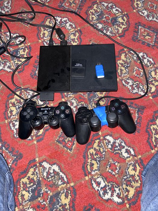 Ps2 slim 2 jostik memor card va filishka holati yangi