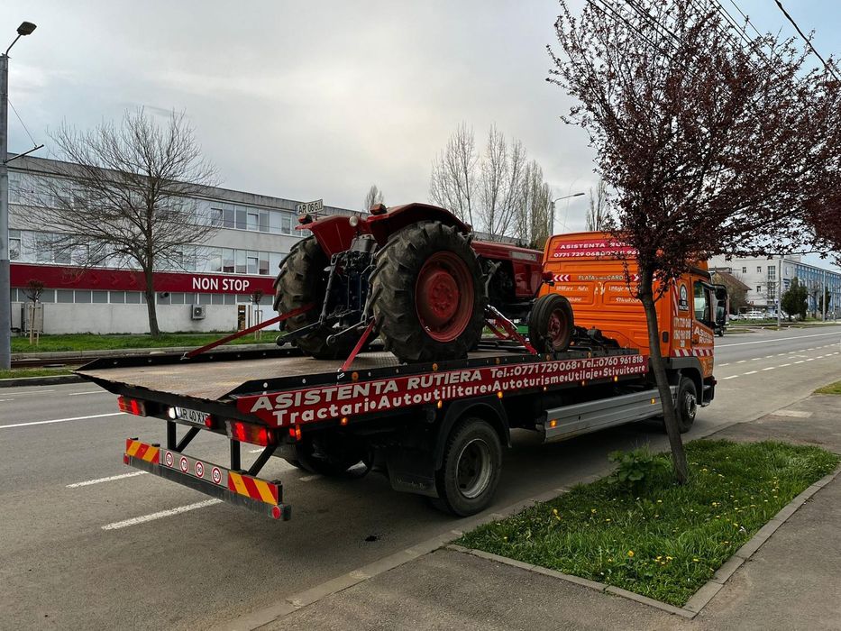 Transport utilaje cu trailer
