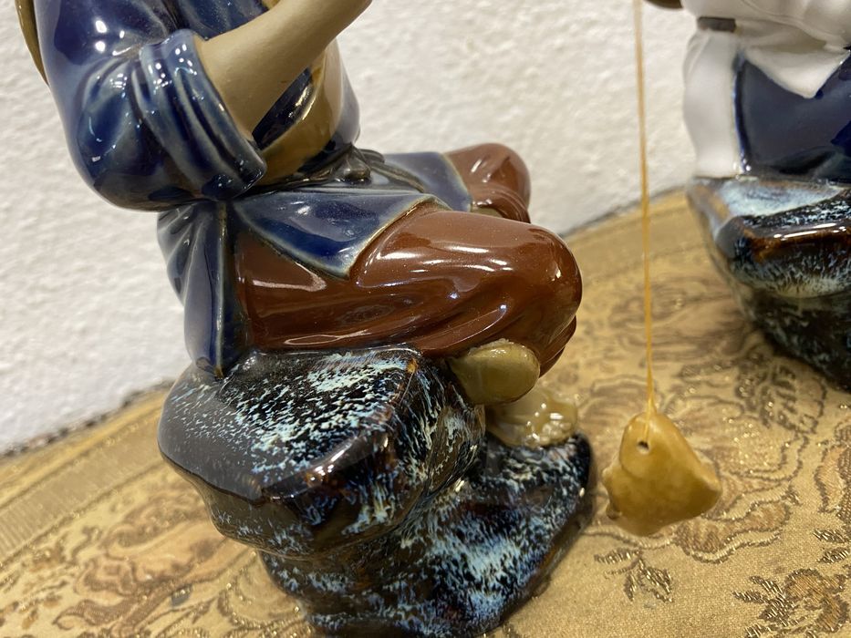 Стари азиятски фигури рибари