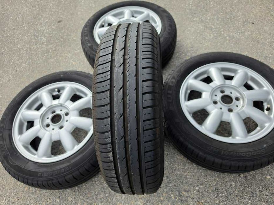 4 бр. Летни гуми 175/65 R15 с алуминиеви джанти 4x100 Mini