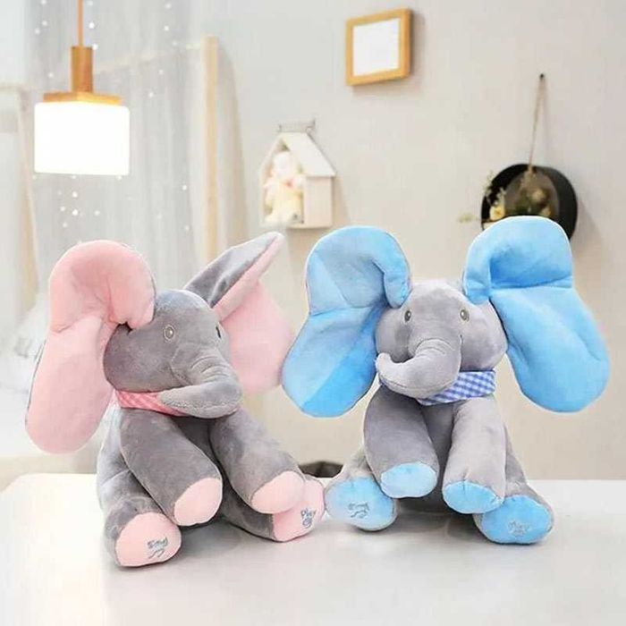 Плюшена играчка Слонче Куку-Бау 33 x 16 см, Пее и Играе, С Ушички за Покриване на Лицето