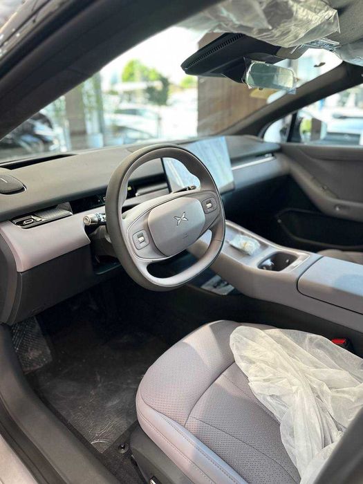 XPENG P7+ 2026 gibrid 1550 km yuradi Rasmiy Kafolat bilan