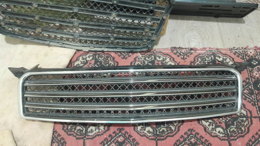 Облицовка нексия 3 га б/у холатда трешина  чизилган жойлари йок