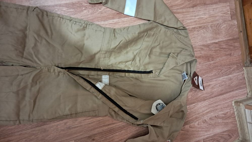 Продам новый фирменный комбинезон!