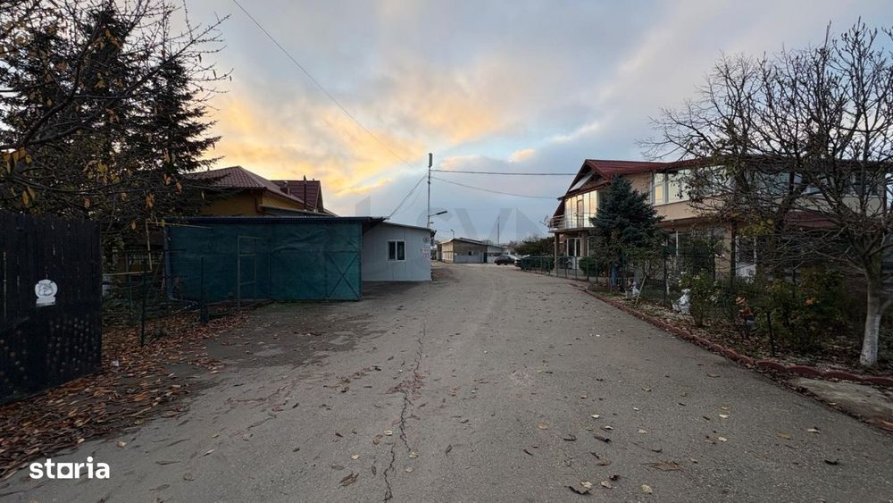 De vanzare Teren 10 316 mp cu 2 case functionale si constructii depozi