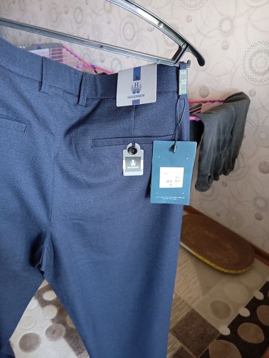 Продам брюки новые