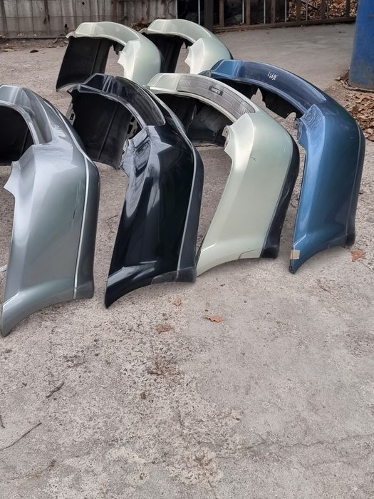 Задний бампер на Subaru Outback BP  2007 год .