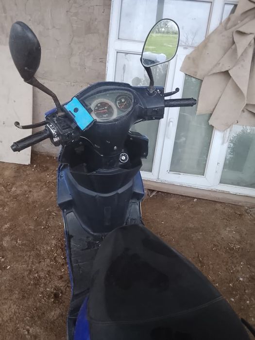 Скутер бензиновый