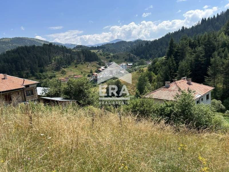 Продава се Парцел в с. Ягодина, Област Смолян - 916 кв.м за 7 €/кв.м - Снимка #1