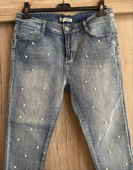 Нови с етикета дамски дънки размер M