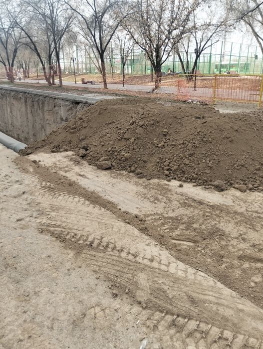 Доставка грунта на засыпку