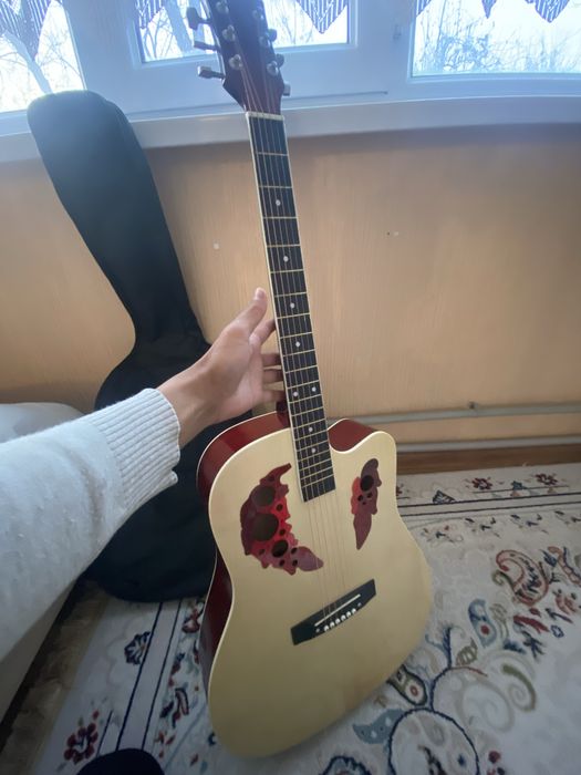 Гитара новый колданылмаган