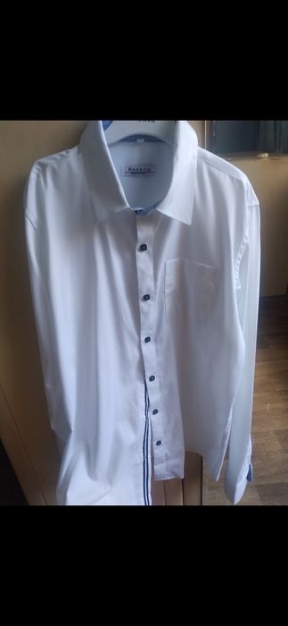 Продам рубашку на мальчика рост 158