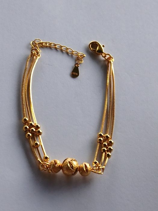 Brățară de dama ,plăcută cu aur 18k