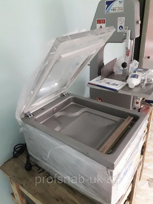 Вакуумный упаковщик.