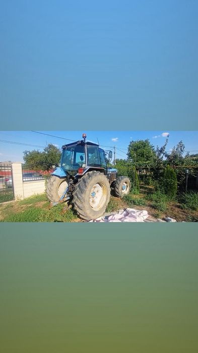 vând tractor New Holland 4x4