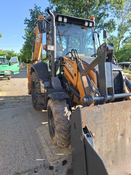 Buldoexcavator case 580st anul 2021