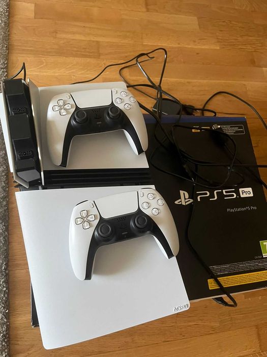 PS5 PRO + extra controller + sony charging pod