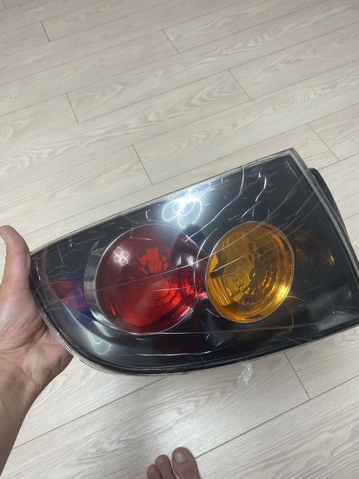 Левый фонарь Мазда 3 BK