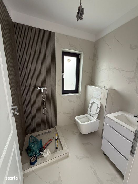 Casa pe parter cu 4 camere , incalzire in pardoseala , teren 400 mp