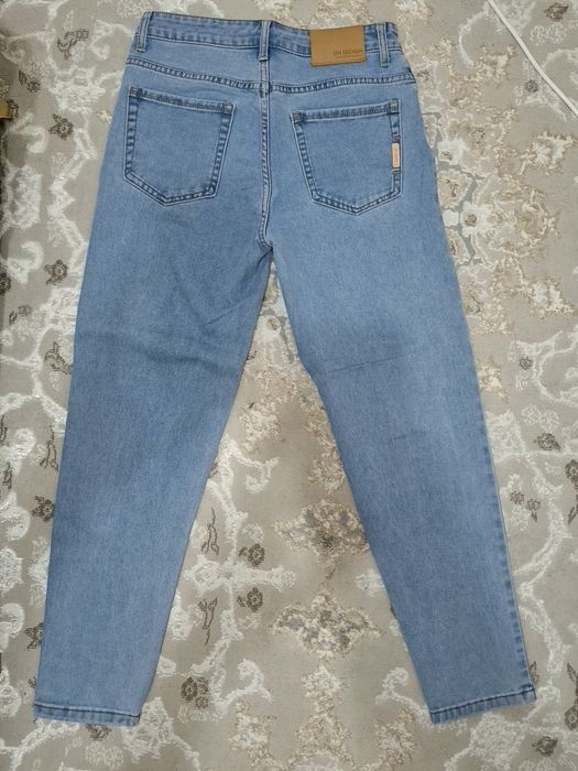 Продам джинсы голубые