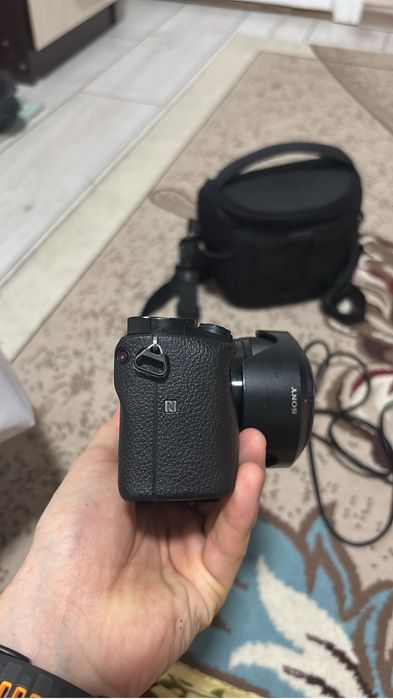 sony a6000 + объектив 35мм или 50мм