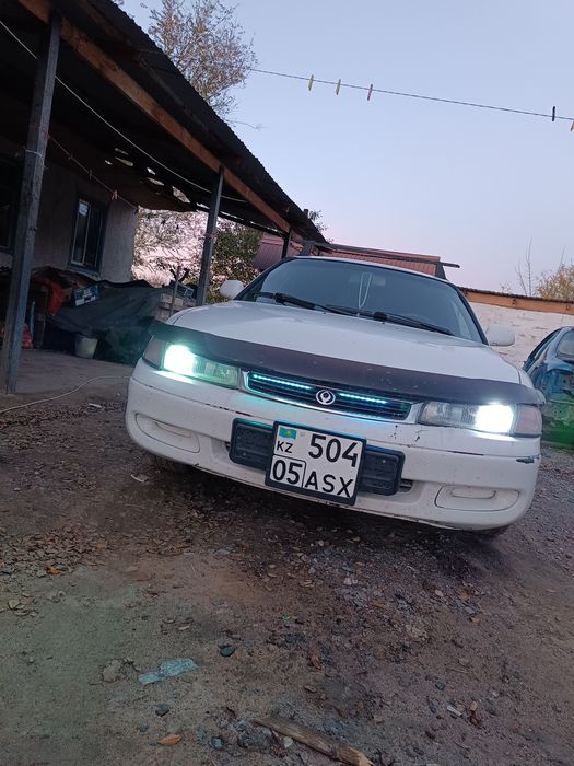 Мазда кронос 2,5