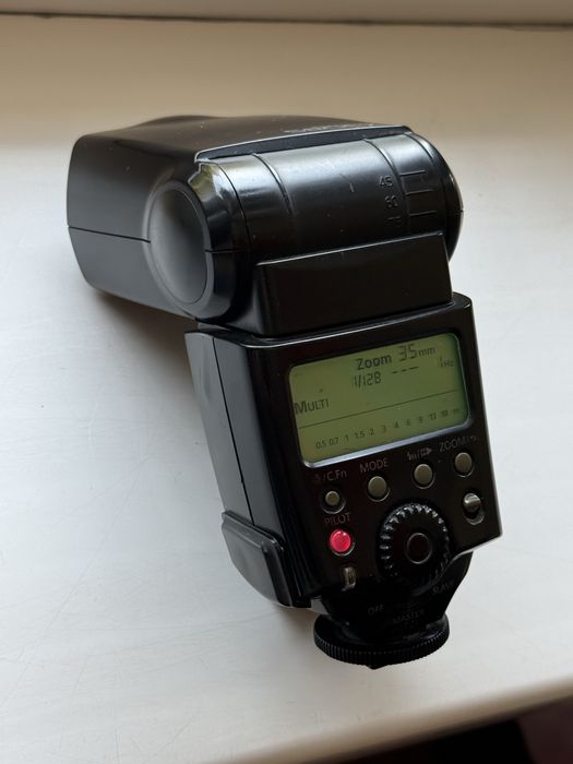 Фотовспышка  Canon