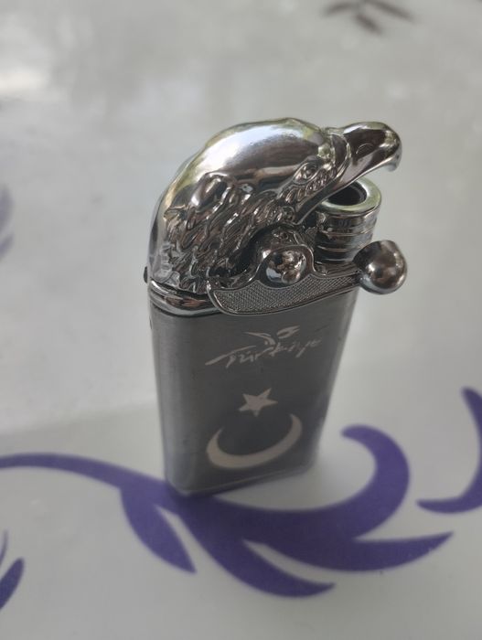 Зажигалка продам