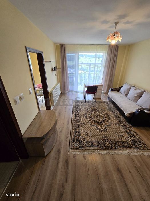 Apartament 1 cameră decomandată Bucătărie separată Parcare exterioară