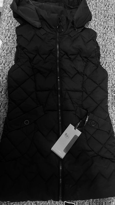 Безрукавка новая