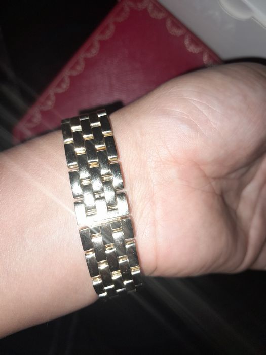 Продам золотые часы.