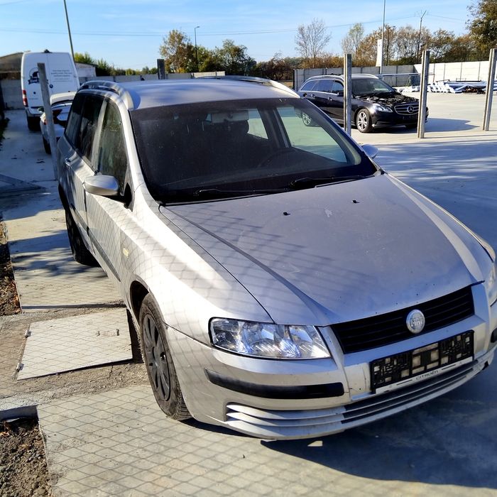 Far/faruri stanga/dreapta Fiat Stilo an 2003-2008