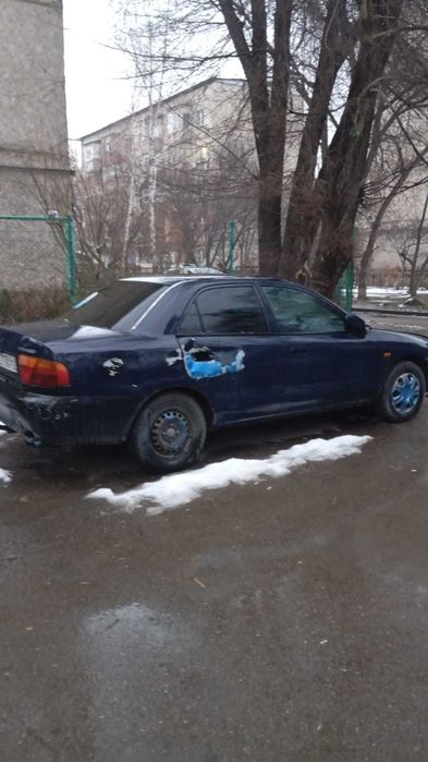 митсубиси каризма