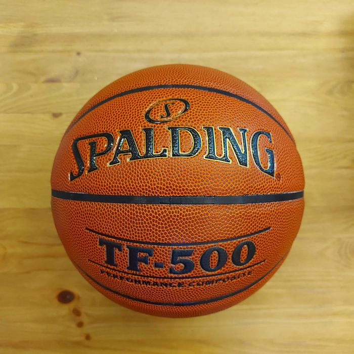 Баскетбольный мяч Spalding. Размер 7. Для зала и улицы. Коричневый.