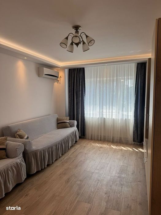 Inchiriere 3 camere, cu loc de parcare, totul nou