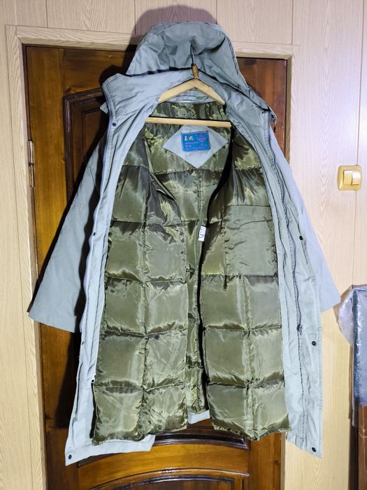 Мужской пуховик с утеплителем.